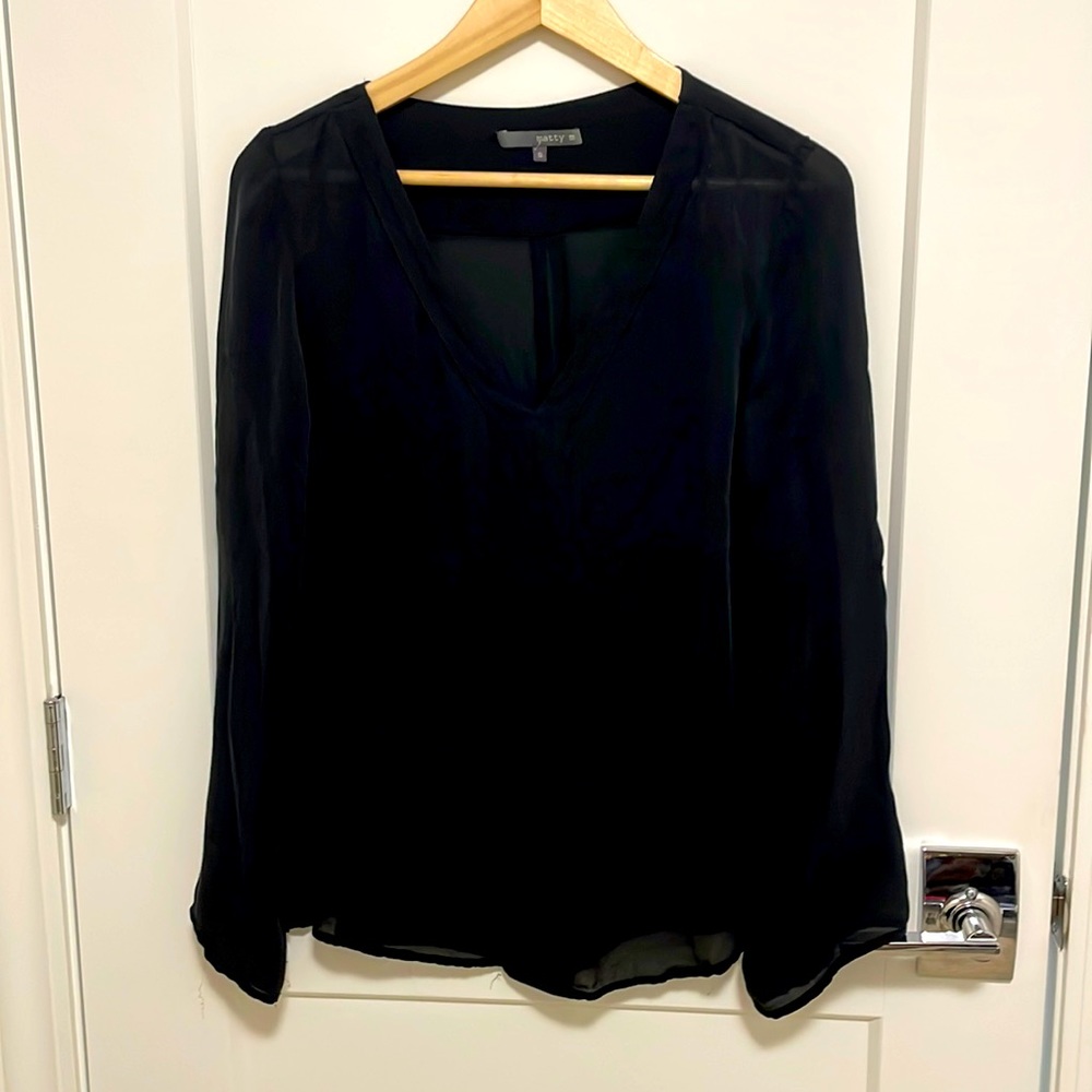 Black tunic top. Good staple piece for fall